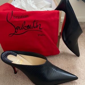 Louboutin slides black!